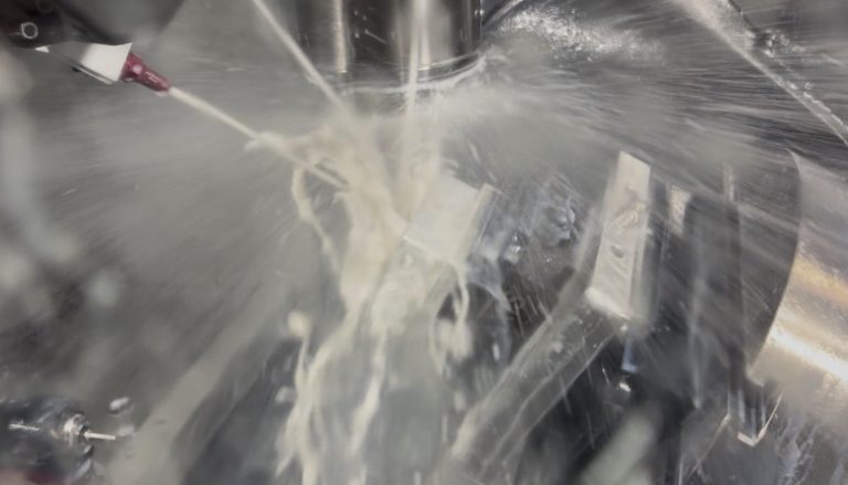 cnc machine spraying lube everywhere